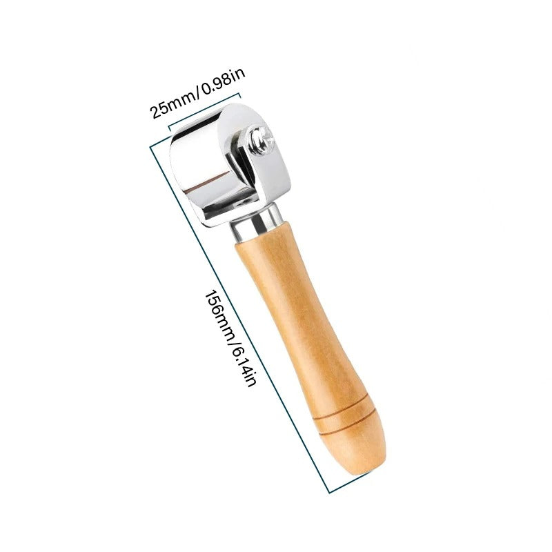Leather roller press with 25mm chrome roller and light wood handle, 156mm